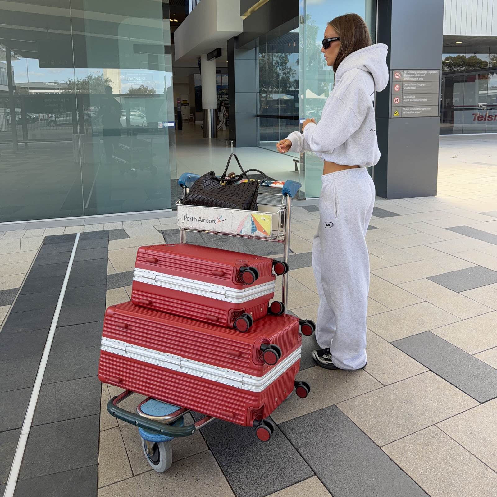 Calm NOBL traveler compared with a stressed overloaded airport traveler